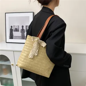 Large capacity woven straw tote bag with lace bow and leather straps on shoulder