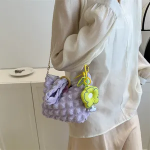 Pastel purple bubble texture shoulder bag with yellow floral charm and wooden handle ring