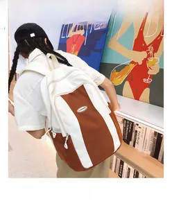 Close-up of contrast color backpack with Fashion patch and large capacity design
