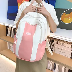 Pink and white contrasting high-capacity school backpack with side pockets and fashion logo