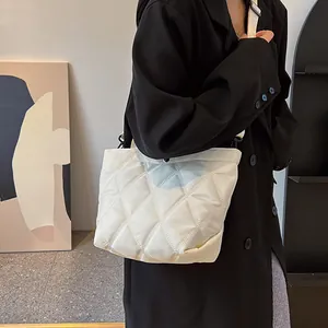 White quilted tote bag for women with minimalist diamond pattern and spacious design