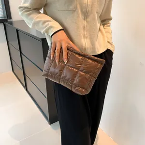 Chic brown quilted puffer clutch bag in minimalist checkered nylon for women fashion