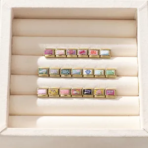 Charms italiens modulables en acier doré avec citations vintage et illustrations