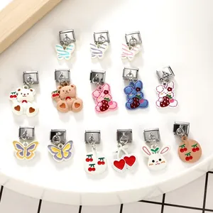 Detailed view of 14 Italian charm links featuring cute colorful animal and fruit motifs