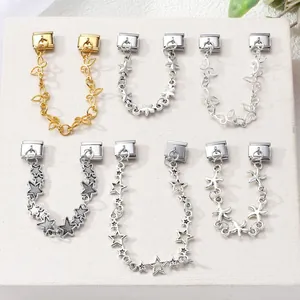 Detailed view of DIY Italian charm links with gold and silver butterfly and star designs