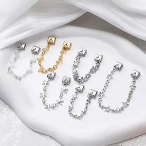 Close-up of Italian charm bracelet dangling links in gold and silver stainless steel