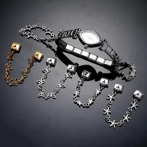 Polished stainless steel modular bracelet with star and butterfly charm details