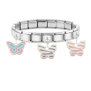 Detail of stainless steel Italian charm bracelet with three colorful enamel butterfly charms