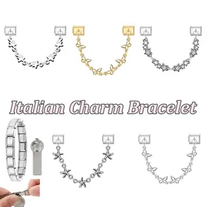 Macro detail of Italian modular charm bracelet showing stainless steel charms and safety chains