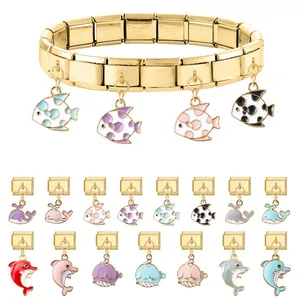 Bracciale componibile italiano in acciaio dorato con ciondoli marini in smalto colorato