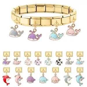 Bracciale componibile italiano in acciaio dorato con charm colorati a forma di pesci