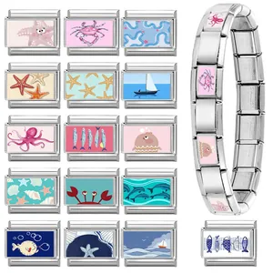 Italian modular charm bracelet with sea star and dolphin icons in stainless steel finish