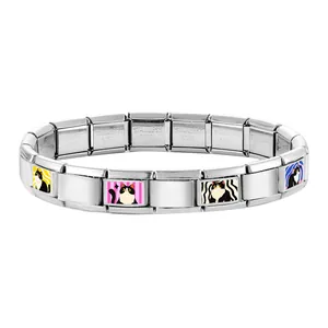 Detail view of Italian charm bracelet links featuring cute cat illustrations and steel stamps
