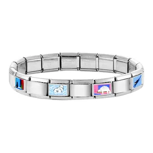 Macro detail of Italian charm bracelet links with cat and dog illustrations and steel stamp
