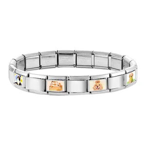Close-up of stainless steel charms with cute pet patterns for modular bracelets
