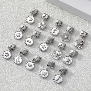 Detailed collection of silver Italian charm pendants with diverse embossed motifs