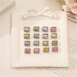 Detailed view of Italian charm links with 16 colorful floral patterns for DIY jewelry