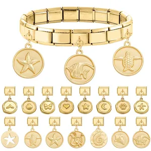 Gold stainless steel modular charm bracelet with sea life pendants like starfish and turtle