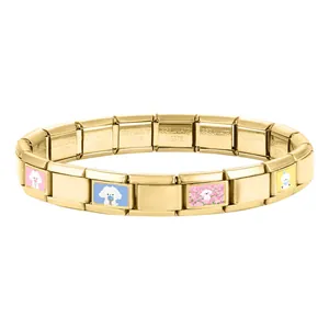 Detail of gold stainless steel charm bracelet featuring hand-painted dog animal icons