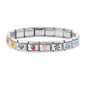 Detail of Italian modular charm bracelet with stainless steel links and colorful enamel charms