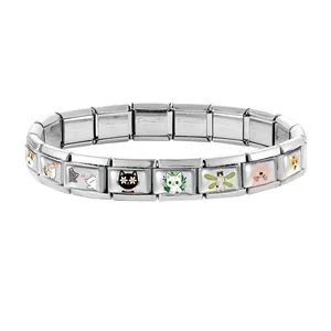 Detail of Italian modular bracelet links showing colorful cartoon pet illustrations