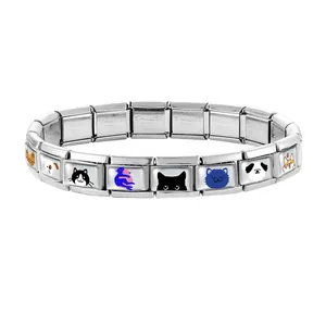 Macro shot of stainless steel Italian charm bracelet links with cartoon cat and dog icons
