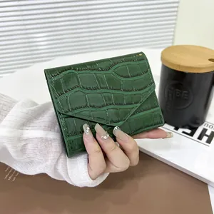 Dark green crocodile texture patent leather envelope bag with sleek foldover flap design