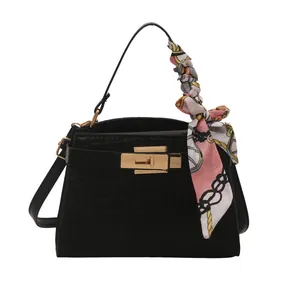 Chic black crocodile pattern handbag for women with silk scarf and gold lock clasp