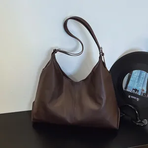 Minimalist large brown tote bag in retro matte faux leather for daily office commuting