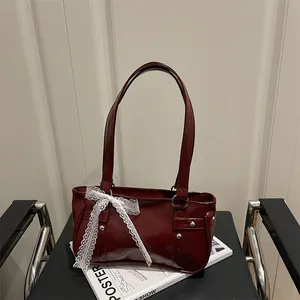 French style dark red patent leather bow pillow bag with white lace and silver studs