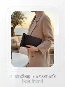 Deep brown woven leather clutch held by a model in a luxury sunset outdoor setting