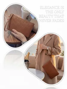 Detailed view of brown woven leather clutch bag with a wristlet strap and top zipper