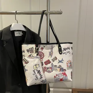 Off-white tote bag with colorful Hong Kong illustration and matching hanging pouch