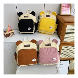 Corduroy backpacks with cute bear ears in cream, pink, yellow, and brown colors