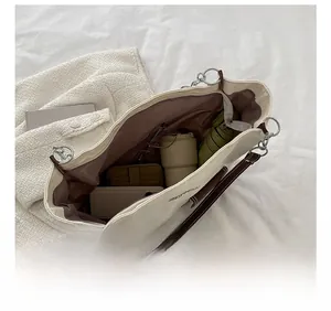Top view of large canvas tote bag interior showing spacious capacity for daily essentials