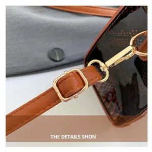 Detailed macro view of adjustable leather shoulder strap with gold-tone metal hardware