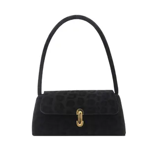 Women's black leopard print suede underarm bag with gold oval clasp and sleek shoulder strap