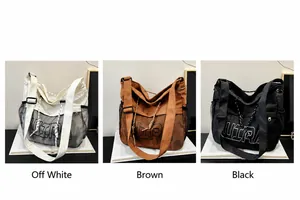 Three-color canvas tote bags with UIRA logo, mesh side pockets and adjustable straps