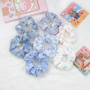 Lot de 7 chouchous en tissu avec motifs floraux et à carreaux en plusieurs couleurs