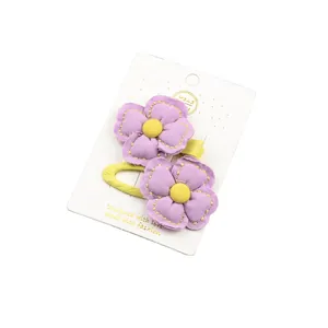 Paire de pinces à cheveux fleur en tissu violet pour filles avec coutures jaunes