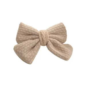 Elegant double-layered knitted mohair bow hair clip in khaki for women's winter styling