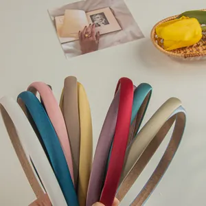 Satin fabric padded headbands in multiple solid colors with non-slip lining for women