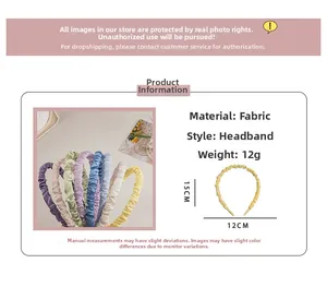 Detail view of ruched satin headband showing fabric texture and 15x12cm dimensions