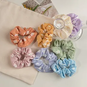 Blumige Haargummis Set in Pastellfarben mit süßen Frühlingsblüten-Mustern