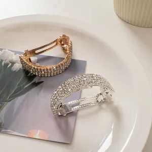 Sparkling rhinestone curved hair clips in gold and silver finish with spring closure