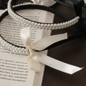 Elegant double-row pearl headband and vintage black satin bow hair accessory set