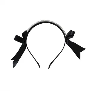 Elegant black double-row pearl headband with long satin bow ribbons in vintage style