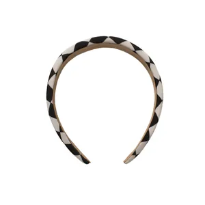 Classic black and white checkered wide headband with sponge padding in fabric finish