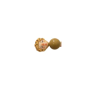 Funny Korean style hair clip with a polka dot face and olive green bead detail