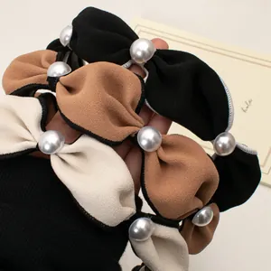 French vintage pearl headband set in black, caramel, and beige matte fabric tones